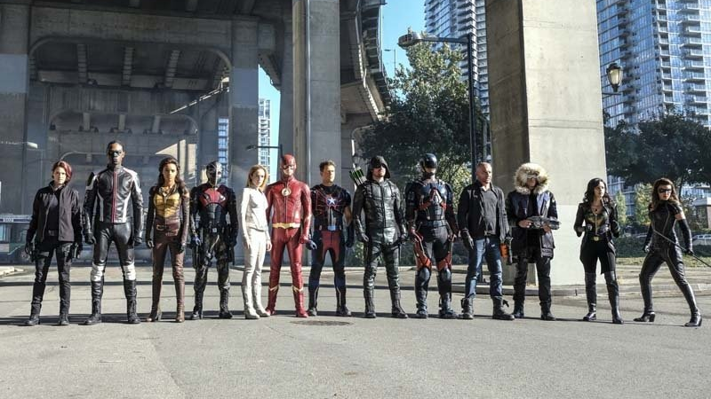 Illustration for article titled Alt-Earth Nazis Invade the Flash's Wedding in Our Giant First Look at the New DC/CW Crossover
